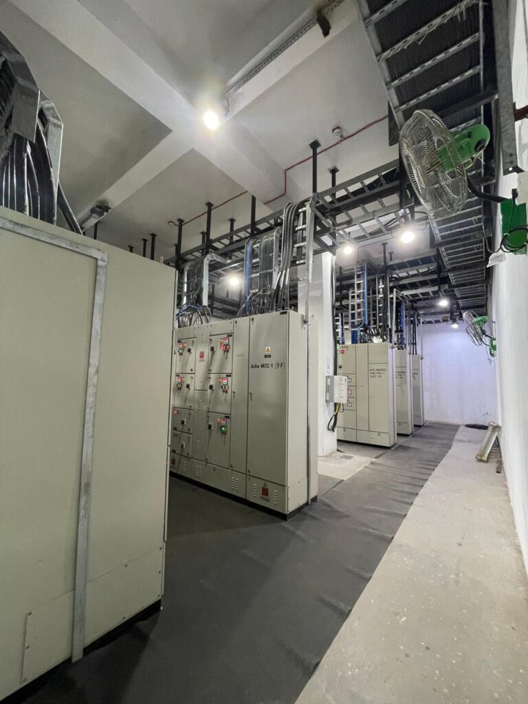 Control cabinets and overhead cable trays