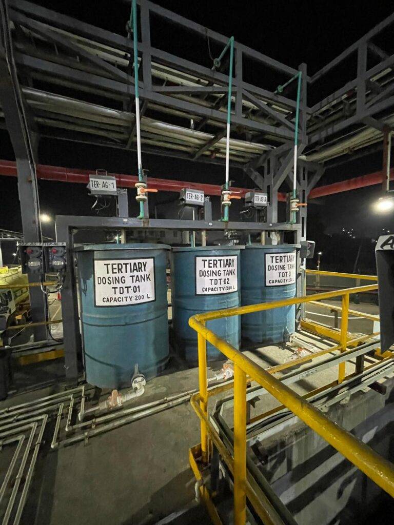 Dosing tanks with access platforms