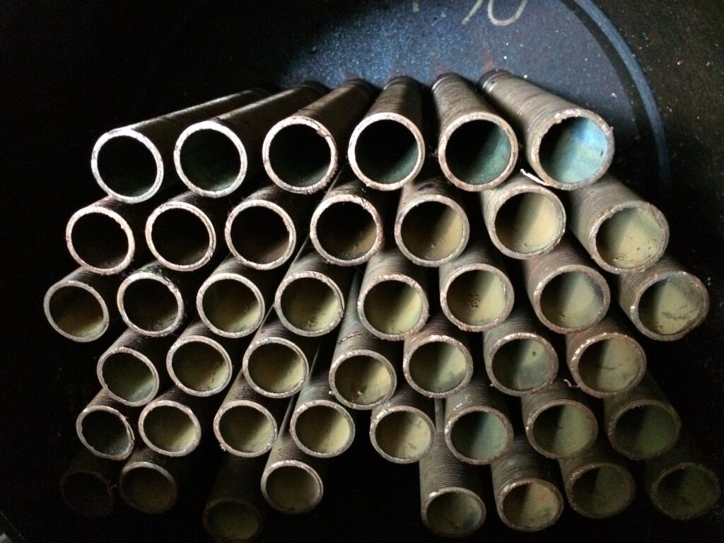 Exposed tube bundle inside a cut-open shell-and-tube heat exchanger